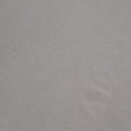 video of a gift card being placed in a diaper shaped gift card holder