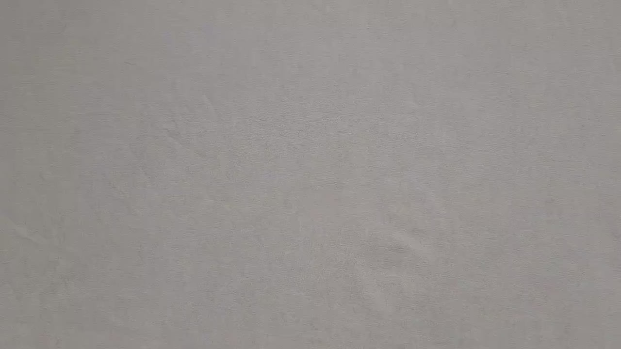 video of a gift card being placed in a diaper shaped gift card holder