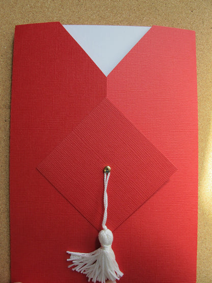graduation invitation in the shop of cap and gown