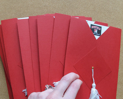 handmade graduation invitations that look like a red cap and gown with real tassel